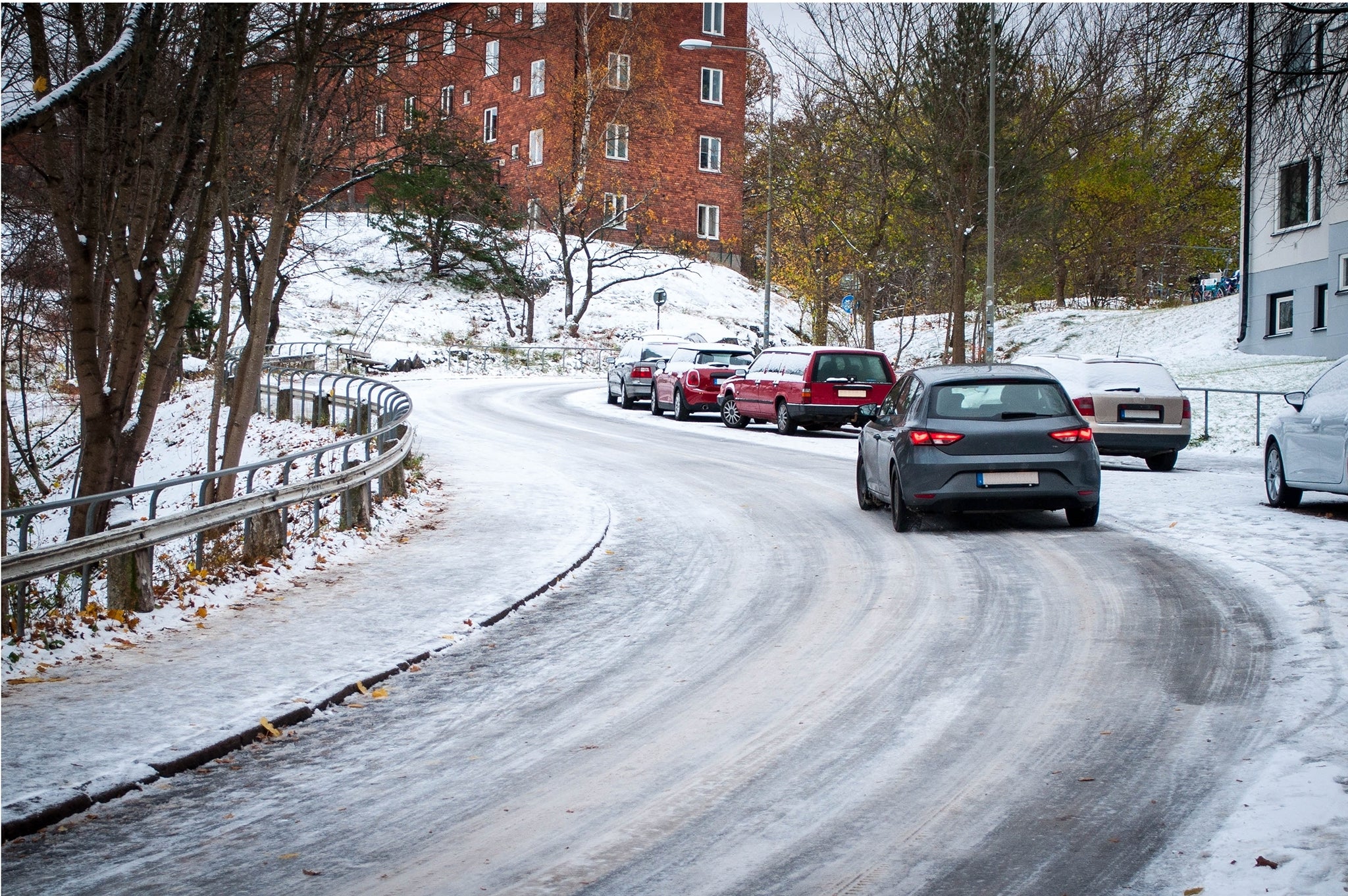 Driving on winter street A car on a winter road in the city.