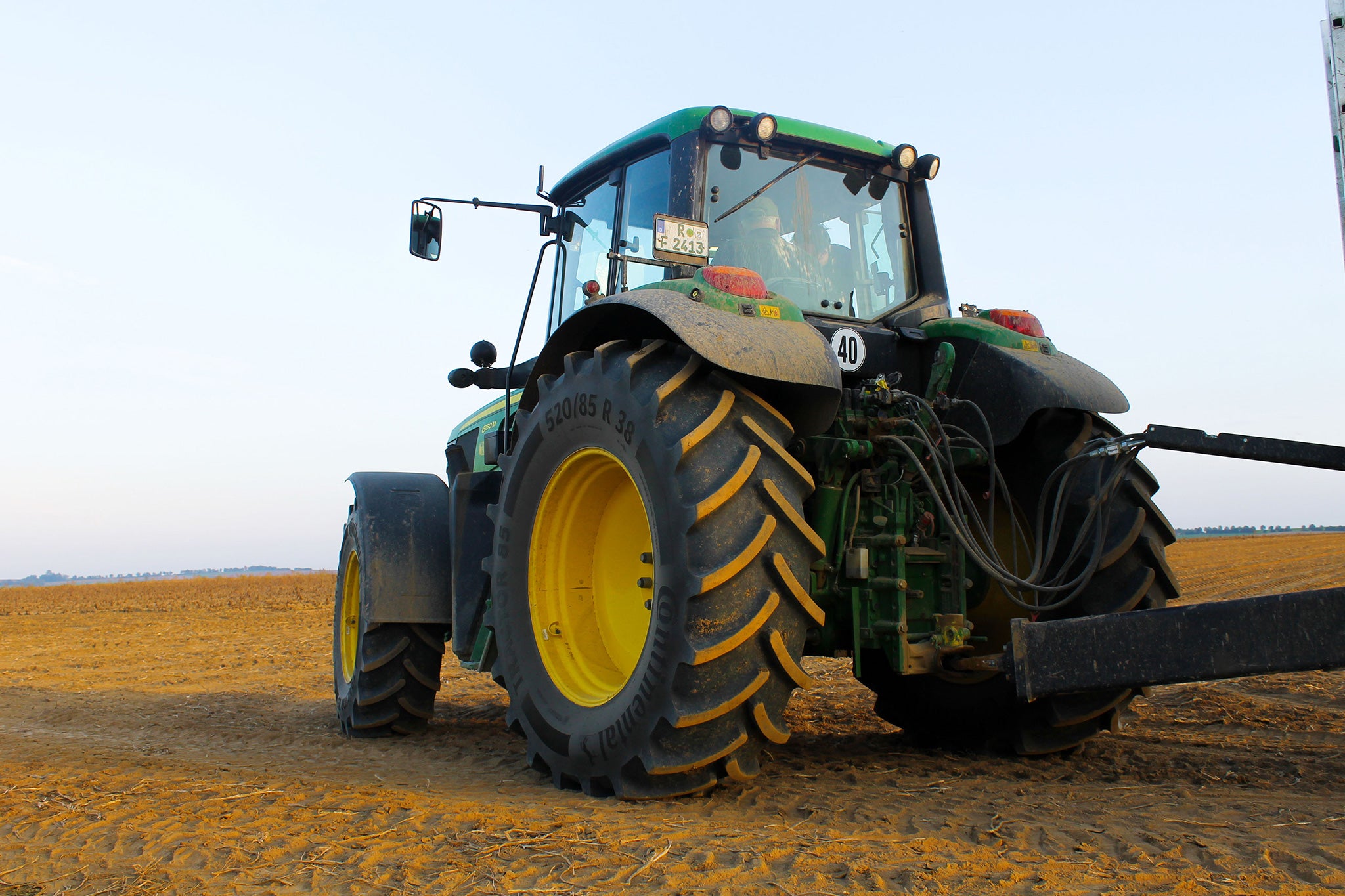 Tractor works in field 