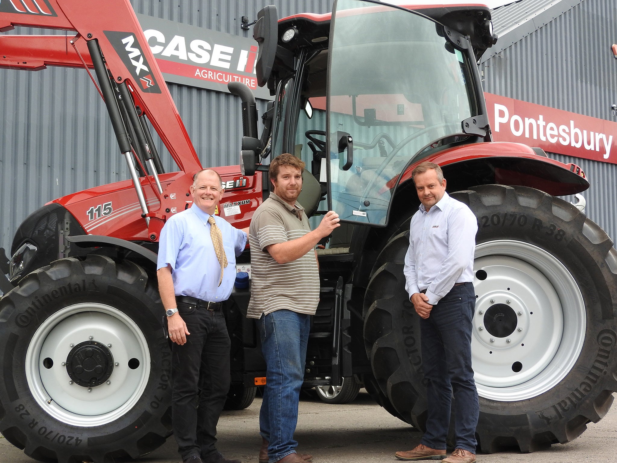 Richard Hutchins, Sales Manager, Continental Agricultural Tires. Tudor Jones, Fron Farm. Paul Hamer, Salesman, Pontesbury Tractors