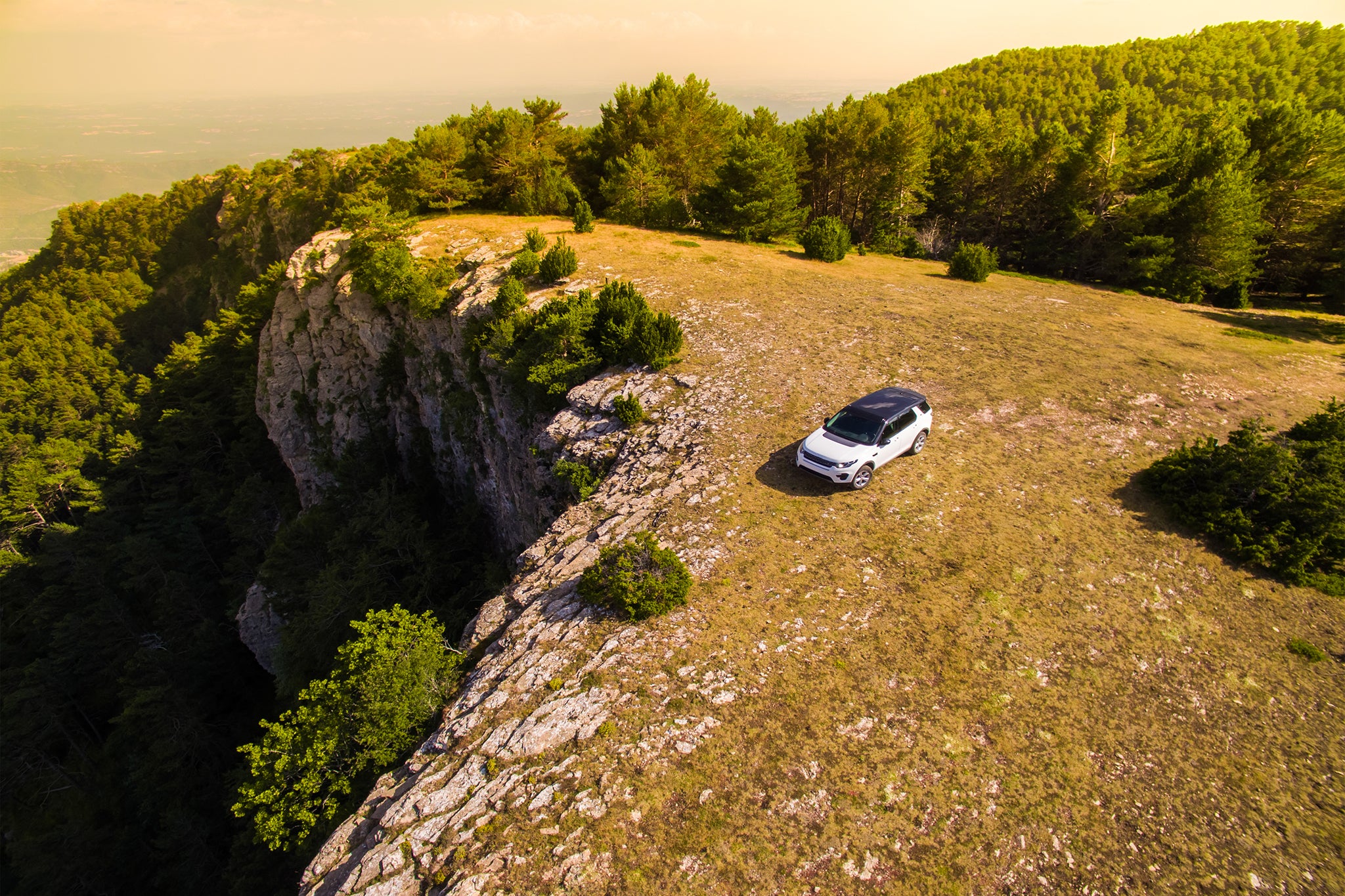 Car in wood landscape Travel vacations on summer by 4x4 in the Catalan Pyrenees.