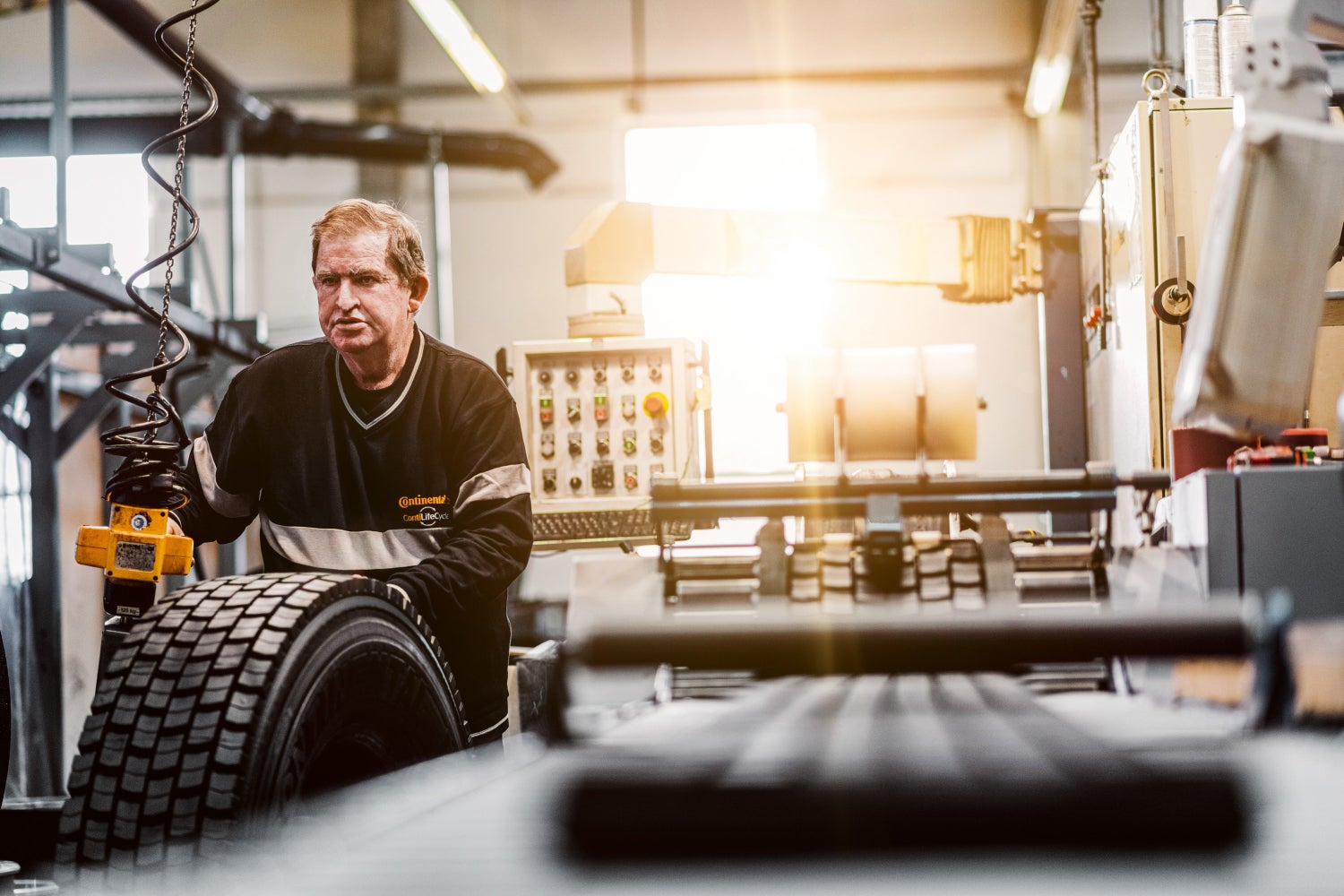 Retreading Employee in workshop
